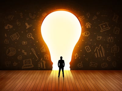 img-business-man-looking-at-light-bulb-as-doorway-01