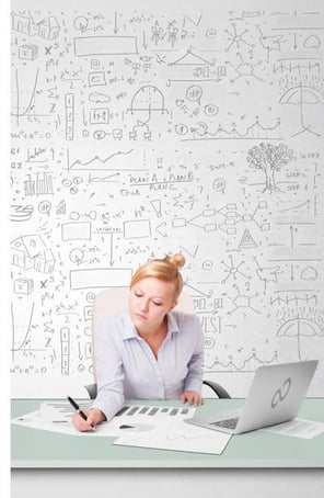 img-woman-using-laptop-and-graphs-and-symbols-02-variation-01